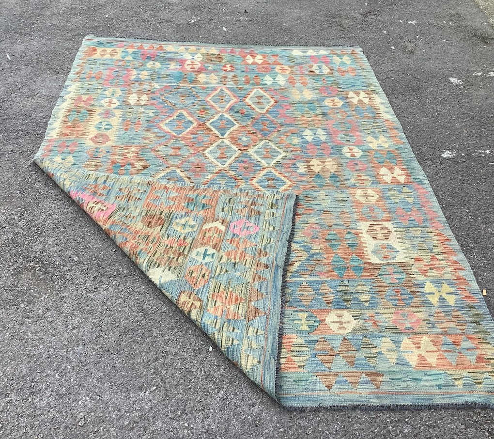 An Anatolian design polychrome flatweave Kilim carpet, 249 x 177cm 249cm x 177cm